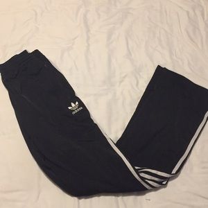 Black and white adidas sweat pants zip pockets